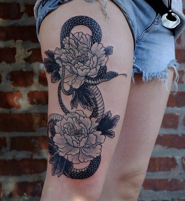 Peony and snake thigh tattoo