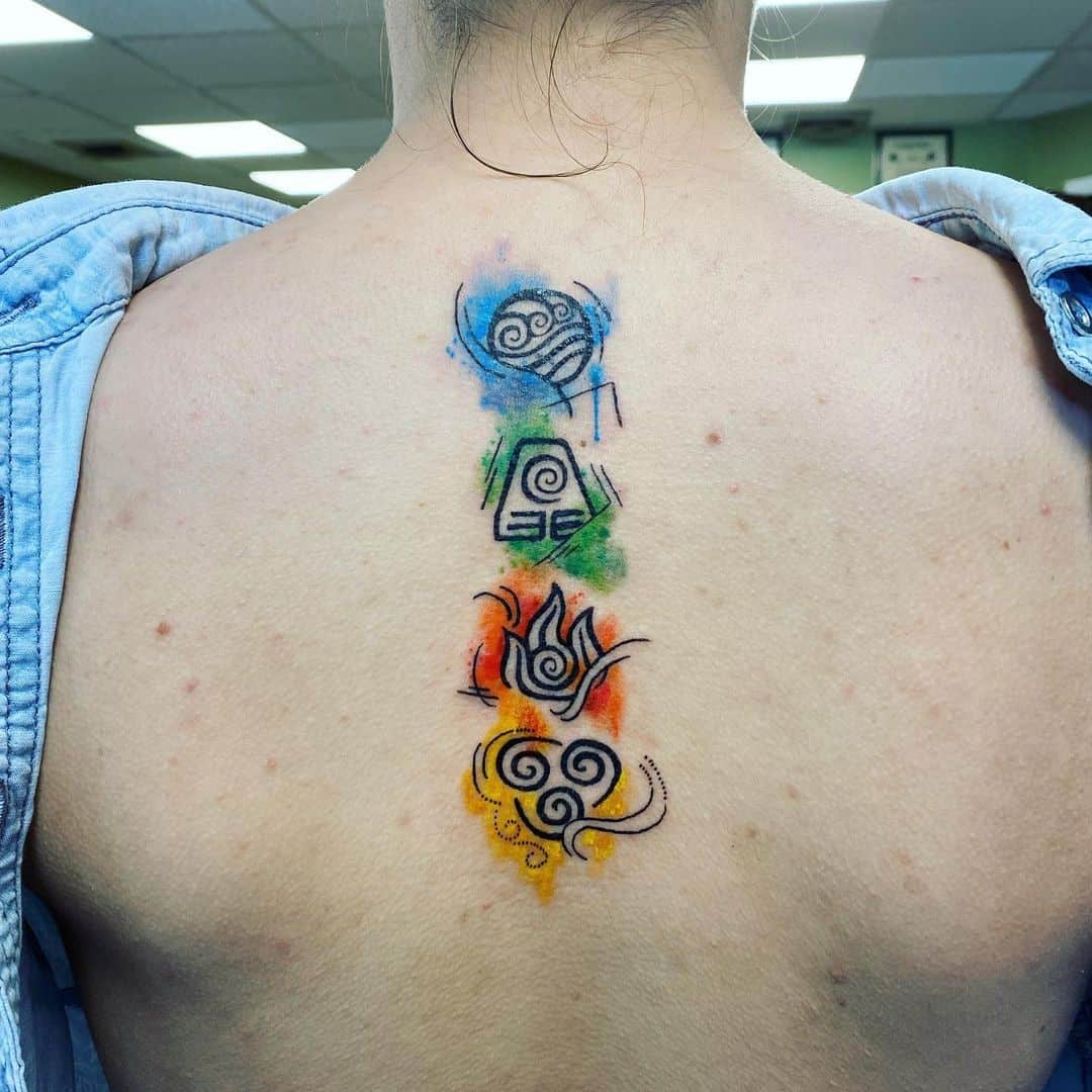 Earth Elements Inspired Spine Tattoo