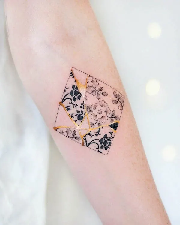 Kintsugi tile tattoo by @adelaide.tattooing