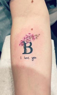 This contains an image of: Letter B Tattoo