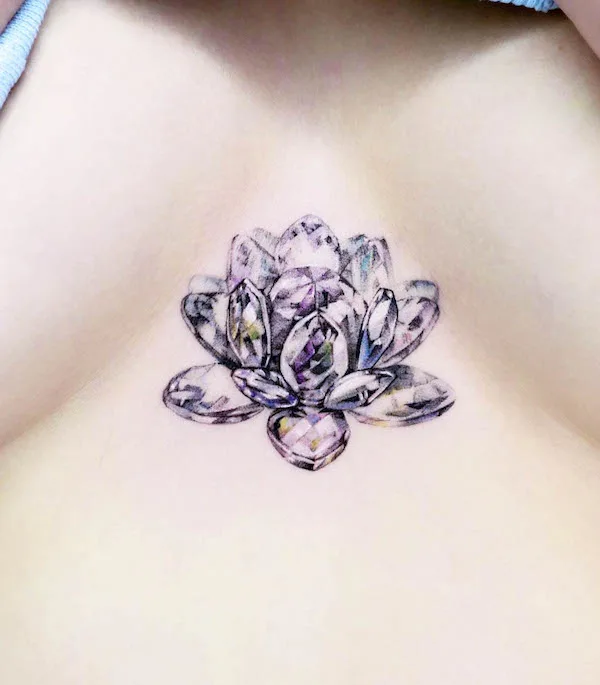 Crystal lotus chest tattoo by @tattooist_siia