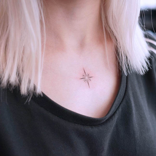 Small star chest tattoo by @kathy_tattoo