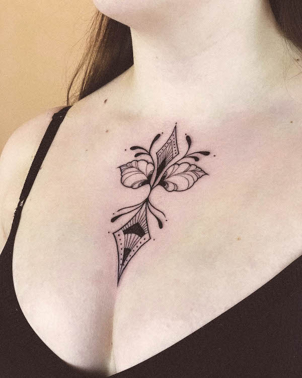 Unique floral pattern chest tattoo by @t.emmas_.ts